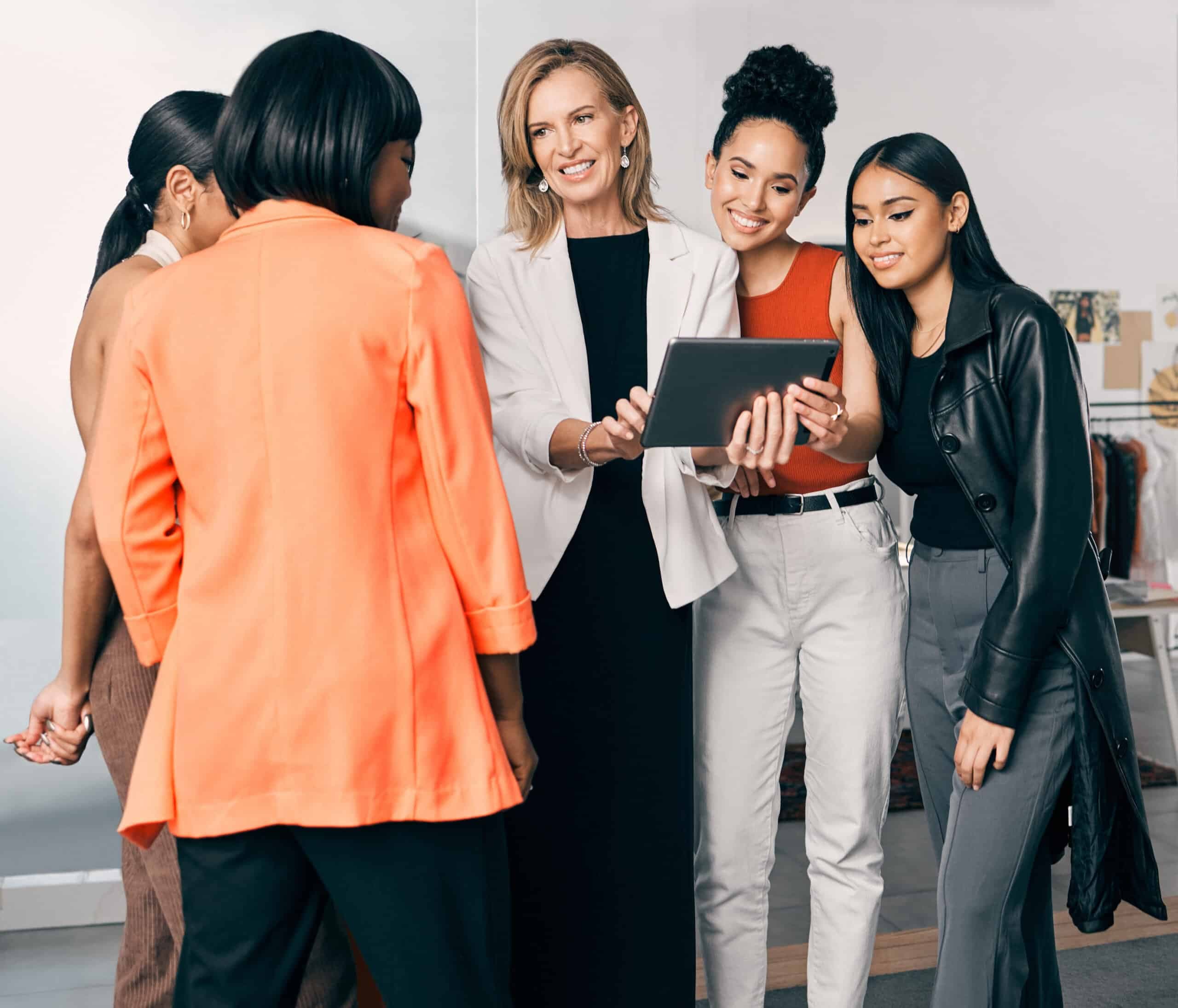Women in business meeting with tablets